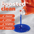Tide boosted clean detergent jug pouring blue liquid from the spout