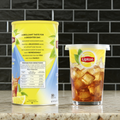 Lipton® Iced Tea Mix packaging with bold text promoting lemon flavor, preparation directions, mixing ratios, and detailed nutrition facts including calories and sugar content.