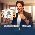 Shah Rukh Khan holding a box of Famous Amos cookies with a blurred indoor background